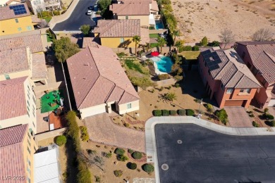 Discover your dream home in this guard-gated golf course on Rhodes Ranch Golf Club in Nevada - for sale on GolfHomes.com, golf home, golf lot