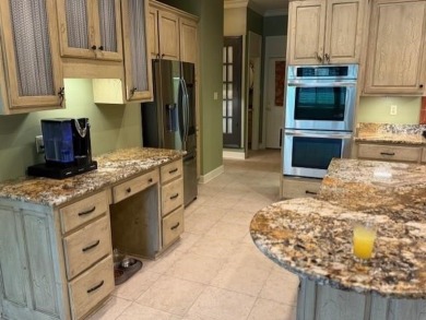 A fee is extra for membership to TPC Clubhouse, including dining on TPC at Southwind in Tennessee - for sale on GolfHomes.com, golf home, golf lot