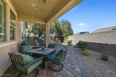 Discover your dream home in this guard-gated golf course on Rhodes Ranch Golf Club in Nevada - for sale on GolfHomes.com, golf home, golf lot