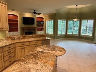 A fee is extra for membership to TPC Clubhouse, including dining on TPC at Southwind in Tennessee - for sale on GolfHomes.com, golf home, golf lot