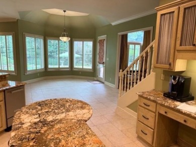 A fee is extra for membership to TPC Clubhouse, including dining on TPC at Southwind in Tennessee - for sale on GolfHomes.com, golf home, golf lot