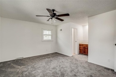 Beautifully updated and spacious home backing near the National on National Golf Club of Kansas City in Missouri - for sale on GolfHomes.com, golf home, golf lot