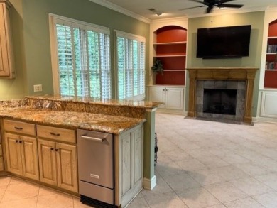 A fee is extra for membership to TPC Clubhouse, including dining on TPC at Southwind in Tennessee - for sale on GolfHomes.com, golf home, golf lot