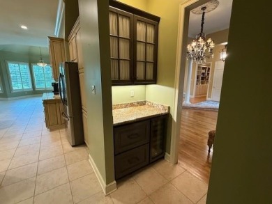 A fee is extra for membership to TPC Clubhouse, including dining on TPC at Southwind in Tennessee - for sale on GolfHomes.com, golf home, golf lot