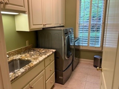 A fee is extra for membership to TPC Clubhouse, including dining on TPC at Southwind in Tennessee - for sale on GolfHomes.com, golf home, golf lot