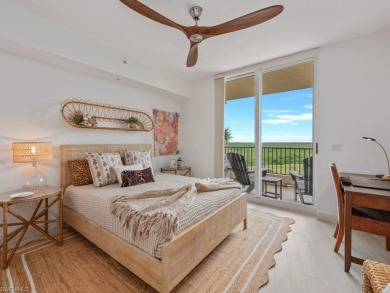Experience refined coastal living in this elegant residence at on Hammock Bay in Florida - for sale on GolfHomes.com, golf home, golf lot