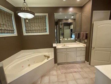 A fee is extra for membership to TPC Clubhouse, including dining on TPC at Southwind in Tennessee - for sale on GolfHomes.com, golf home, golf lot