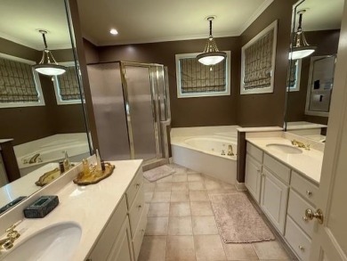A fee is extra for membership to TPC Clubhouse, including dining on TPC at Southwind in Tennessee - for sale on GolfHomes.com, golf home, golf lot