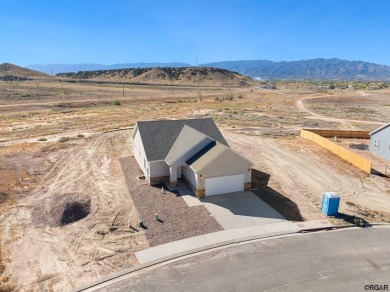 Welcome to 606 Cowboy Way where comfort meets potential. This on Four Mile Ranch Golf Club in Colorado - for sale on GolfHomes.com, golf home, golf lot