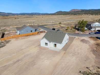 Welcome to 606 Cowboy Way where comfort meets potential. This on Four Mile Ranch Golf Club in Colorado - for sale on GolfHomes.com, golf home, golf lot