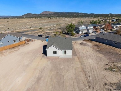 Welcome to 606 Cowboy Way where comfort meets potential. This on Four Mile Ranch Golf Club in Colorado - for sale on GolfHomes.com, golf home, golf lot