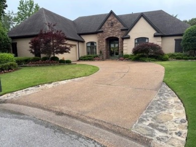 A fee is extra for membership to TPC Clubhouse, including dining on TPC at Southwind in Tennessee - for sale on GolfHomes.com, golf home, golf lot