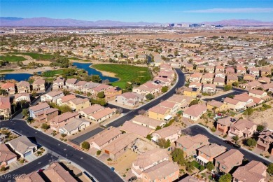 Discover your dream home in this guard-gated golf course on Rhodes Ranch Golf Club in Nevada - for sale on GolfHomes.com, golf home, golf lot