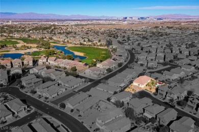 Discover your dream home in this guard-gated golf course on Rhodes Ranch Golf Club in Nevada - for sale on GolfHomes.com, golf home, golf lot