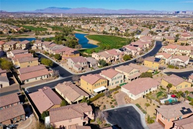 Discover your dream home in this guard-gated golf course on Rhodes Ranch Golf Club in Nevada - for sale on GolfHomes.com, golf home, golf lot