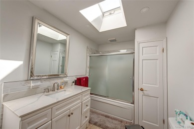 This well-proportioned home offers a formal dining room on Brentwood Country Club in New York - for sale on GolfHomes.com, golf home, golf lot