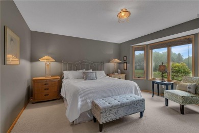 Welcome to this stunning high-end townhome perfectly perched on Majestic Oaks Golf Club  in Minnesota - for sale on GolfHomes.com, golf home, golf lot