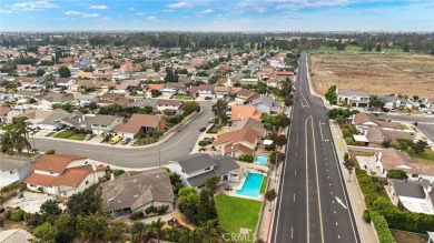This 5 Bedroom, 3 Bath La Linda Pool Home presents a rare and on Mile Square Golf Course in California - for sale on GolfHomes.com, golf home, golf lot