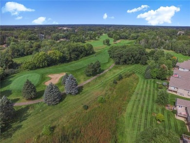 Welcome to this stunning high-end townhome perfectly perched on Majestic Oaks Golf Club  in Minnesota - for sale on GolfHomes.com, golf home, golf lot
