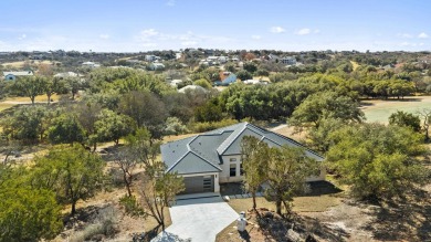 This home is a stunning 4-bedroom property designed to maximize on Ram Rock Golf Course in Texas - for sale on GolfHomes.com, golf home, golf lot