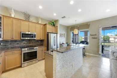 Stunning Designer Condo with Expansive Lake Views in the Heart on Pelican Sound Golf and River Club in Florida - for sale on GolfHomes.com, golf home, golf lot