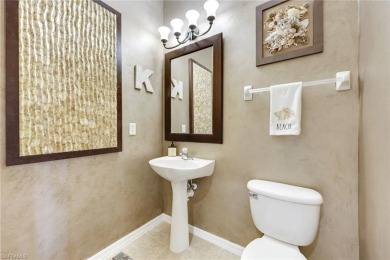 Stunning Designer Condo with Expansive Lake Views in the Heart on Pelican Sound Golf and River Club in Florida - for sale on GolfHomes.com, golf home, golf lot