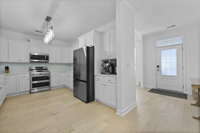 Welcome to 132 Fresh Meadow Lane - An Exceptional End-Unit on Dunes West Golf Club in South Carolina - for sale on GolfHomes.com, golf home, golf lot