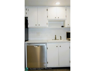 HUGE PRICE REDUCTION! This 5th-floor condo offers 1,500 square on Palm-Aire Country Club and Resort - The Oaks in Florida - for sale on GolfHomes.com, golf home, golf lot