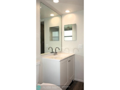 HUGE PRICE REDUCTION! This 5th-floor condo offers 1,500 square on Palm-Aire Country Club and Resort - The Oaks in Florida - for sale on GolfHomes.com, golf home, golf lot