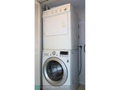 HUGE PRICE REDUCTION! This 5th-floor condo offers 1,500 square on Palm-Aire Country Club and Resort - The Oaks in Florida - for sale on GolfHomes.com, golf home, golf lot