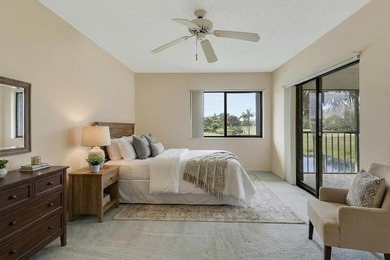 Enjoy panoramic golf and lake views from this 2 bedroom, 2 bath on  in Florida - for sale on GolfHomes.com, golf home, golf lot