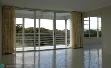 HUGE PRICE REDUCTION! This 5th-floor condo offers 1,500 square on Palm-Aire Country Club and Resort - The Oaks in Florida - for sale on GolfHomes.com, golf home, golf lot