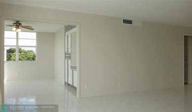 HUGE PRICE REDUCTION! This 5th-floor condo offers 1,500 square on Palm-Aire Country Club and Resort - The Oaks in Florida - for sale on GolfHomes.com, golf home, golf lot