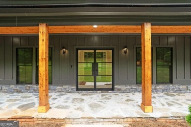 nWelcome to this stunning Craftsman home nestled on a beautiful on The Club River Forest in Georgia - for sale on GolfHomes.com, golf home, golf lot