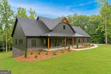 nWelcome to this stunning Craftsman home nestled on a beautiful on The Club River Forest in Georgia - for sale on GolfHomes.com, golf home, golf lot