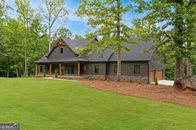 nWelcome to this stunning Craftsman home nestled on a beautiful on The Club River Forest in Georgia - for sale on GolfHomes.com, golf home, golf lot