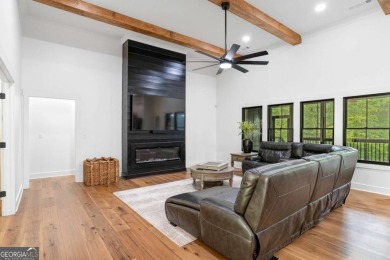 nWelcome to this stunning Craftsman home nestled on a beautiful on The Club River Forest in Georgia - for sale on GolfHomes.com, golf home, golf lot