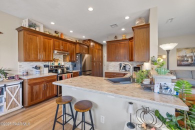 This beautifully updated 3-bedroom, 2-bathroom residence on Quail Wood Greens Golf Course in Arizona - for sale on GolfHomes.com, golf home, golf lot