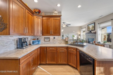 This beautifully updated 3-bedroom, 2-bathroom residence on Quail Wood Greens Golf Course in Arizona - for sale on GolfHomes.com, golf home, golf lot