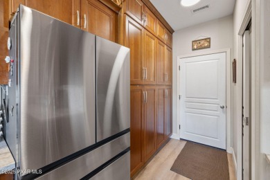 This beautifully updated 3-bedroom, 2-bathroom residence on Quail Wood Greens Golf Course in Arizona - for sale on GolfHomes.com, golf home, golf lot