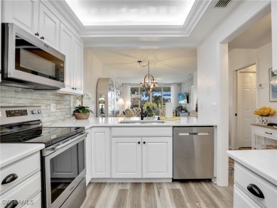 Delight in the elegance of a fully remodeled first-floor condo on Golfview Golf and Racquet Club in Florida - for sale on GolfHomes.com, golf home, golf lot