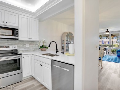 Delight in the elegance of a fully remodeled first-floor condo on Golfview Golf and Racquet Club in Florida - for sale on GolfHomes.com, golf home, golf lot