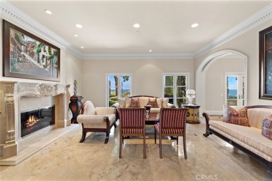 Indulge in elegant coastal living at this opulent ocean-view on Pelican Hill Golf Club in California - for sale on GolfHomes.com, golf home, golf lot