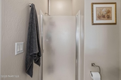 This beautifully updated 3-bedroom, 2-bathroom residence on Quail Wood Greens Golf Course in Arizona - for sale on GolfHomes.com, golf home, golf lot
