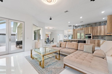 Welcome to this beautiful modern waterfront home with private on The Bears Club in Florida - for sale on GolfHomes.com, golf home, golf lot