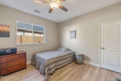 This beautifully updated 3-bedroom, 2-bathroom residence on Quail Wood Greens Golf Course in Arizona - for sale on GolfHomes.com, golf home, golf lot