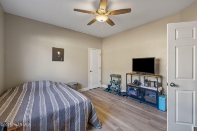 This beautifully updated 3-bedroom, 2-bathroom residence on Quail Wood Greens Golf Course in Arizona - for sale on GolfHomes.com, golf home, golf lot