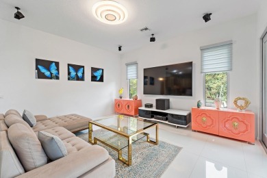 Welcome to this beautiful modern waterfront home with private on The Bears Club in Florida - for sale on GolfHomes.com, golf home, golf lot