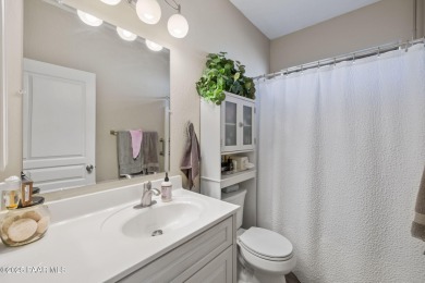 This beautifully updated 3-bedroom, 2-bathroom residence on Quail Wood Greens Golf Course in Arizona - for sale on GolfHomes.com, golf home, golf lot