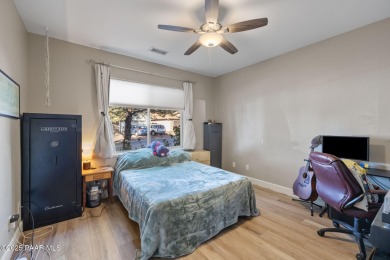 This beautifully updated 3-bedroom, 2-bathroom residence on Quail Wood Greens Golf Course in Arizona - for sale on GolfHomes.com, golf home, golf lot